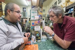 Customers visiting Paul’s Pipe Shop learn about the history, culture, and craft of pipes.