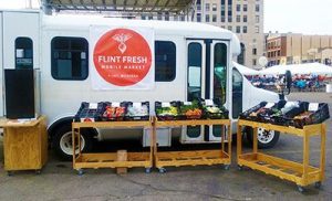 Flint Fresh Mobile Market offerings include pre-made salads, sandwiches, fruit, vegetables, lentils and other dry goods. Photo courtesy of YMCA of Greater Flint